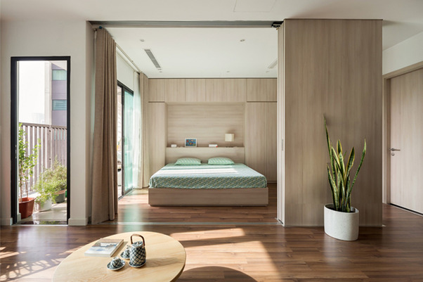 Không dùng tường ngăn giúp phòng ngủ rộng và thoáng hơn